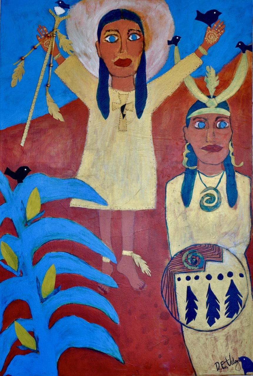 two women with headdresses participate in a ceremony