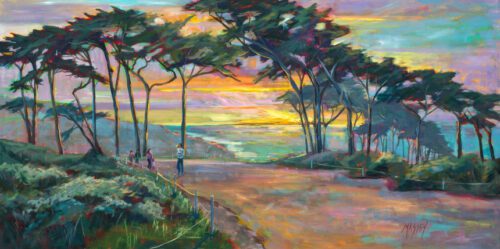 a group of cypress trees stand in front of a multicolored sunset