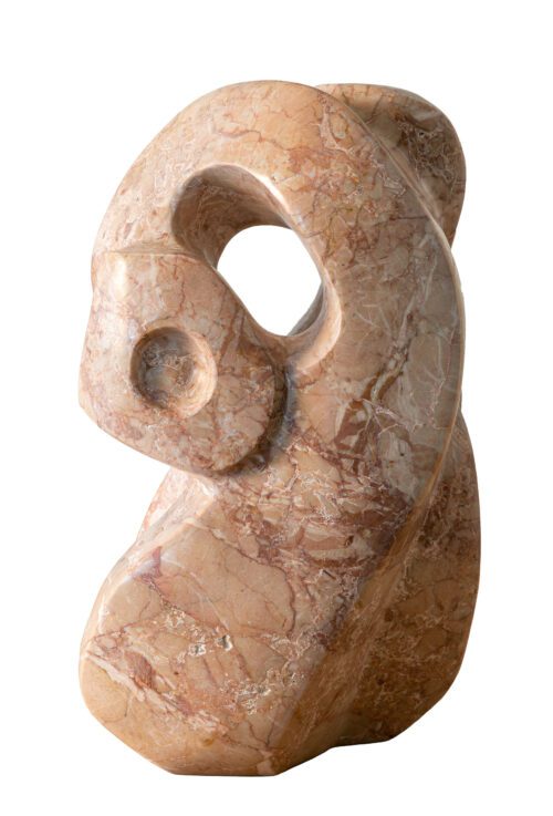 a pale pin marble statue with circles and curves cut out