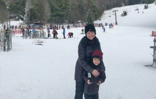 Jennifer Costello and her son in the snow.