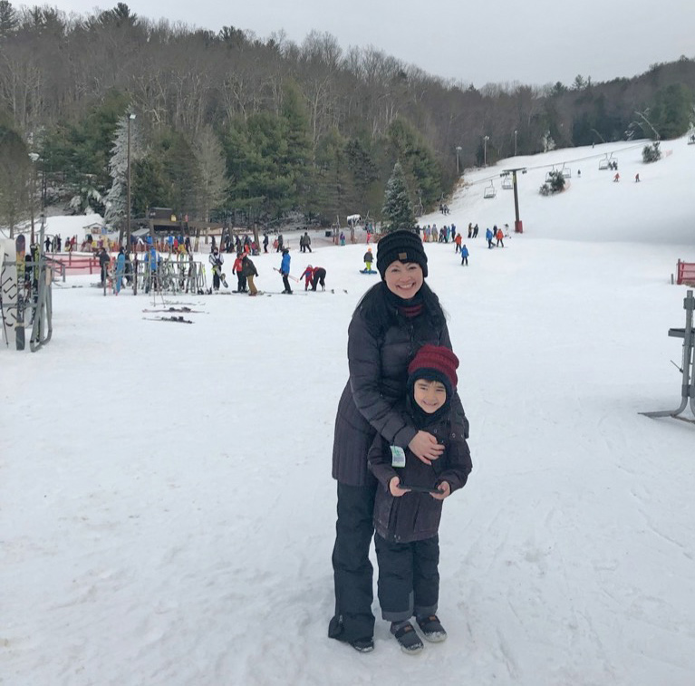  Jennifer Costello and her son in the snow.
