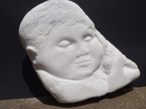 face in marble